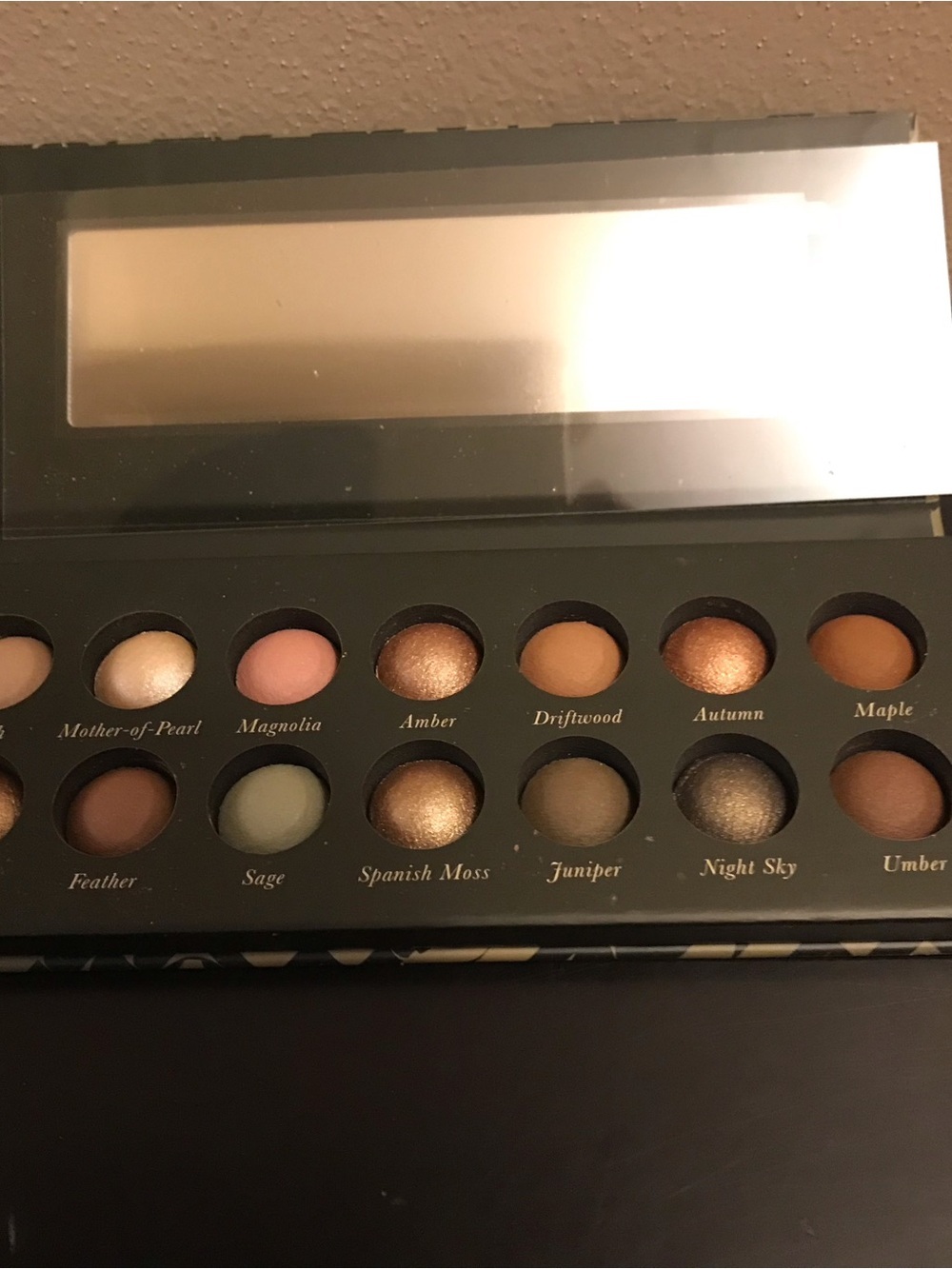 Laura Geller baked eyeshadow palette earthy essentials.